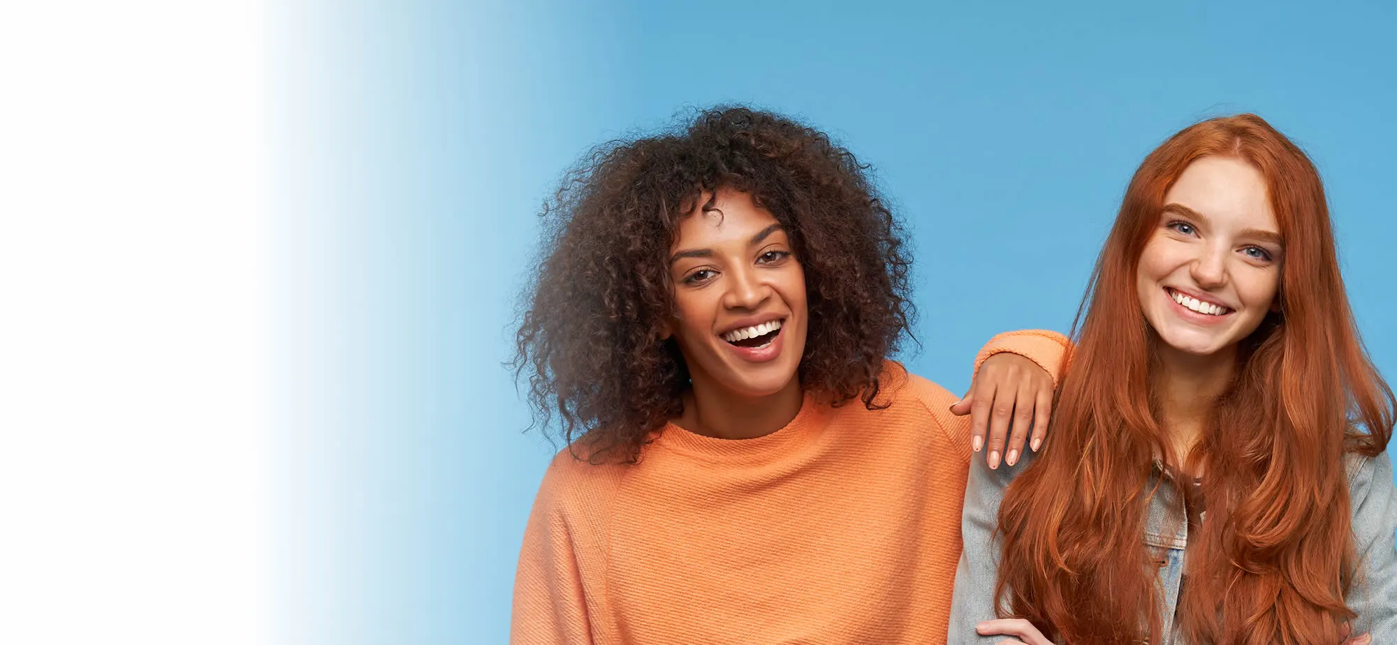 Two smiling patients of Charlottesville Dental Care